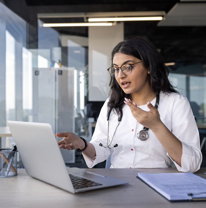 Healthcare worker talking online with patient